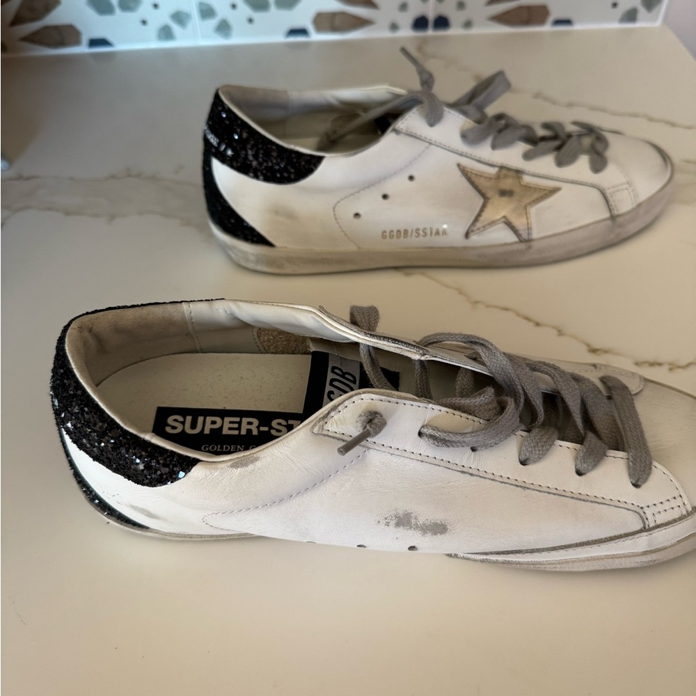 Women's Super-Star with gold star and black glitter heel tab
